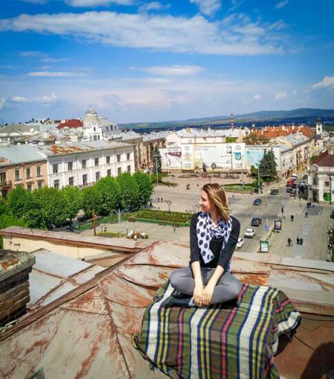 Anastasiia Lutchenko atop a building