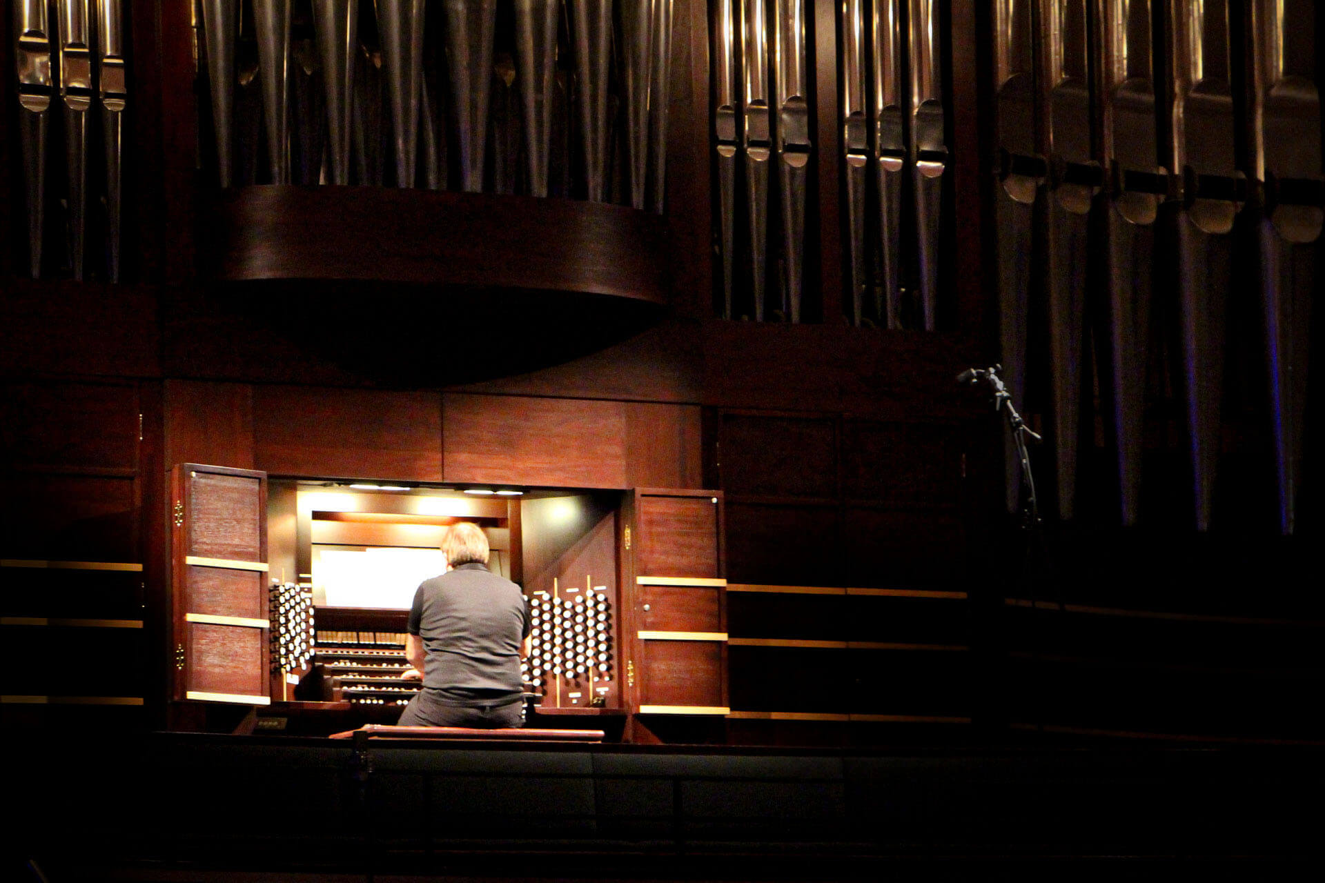 A lone organist plays during the convocation ceremony in 2020. The broadcast was recorded at the Winspear Centre in Edmonton.