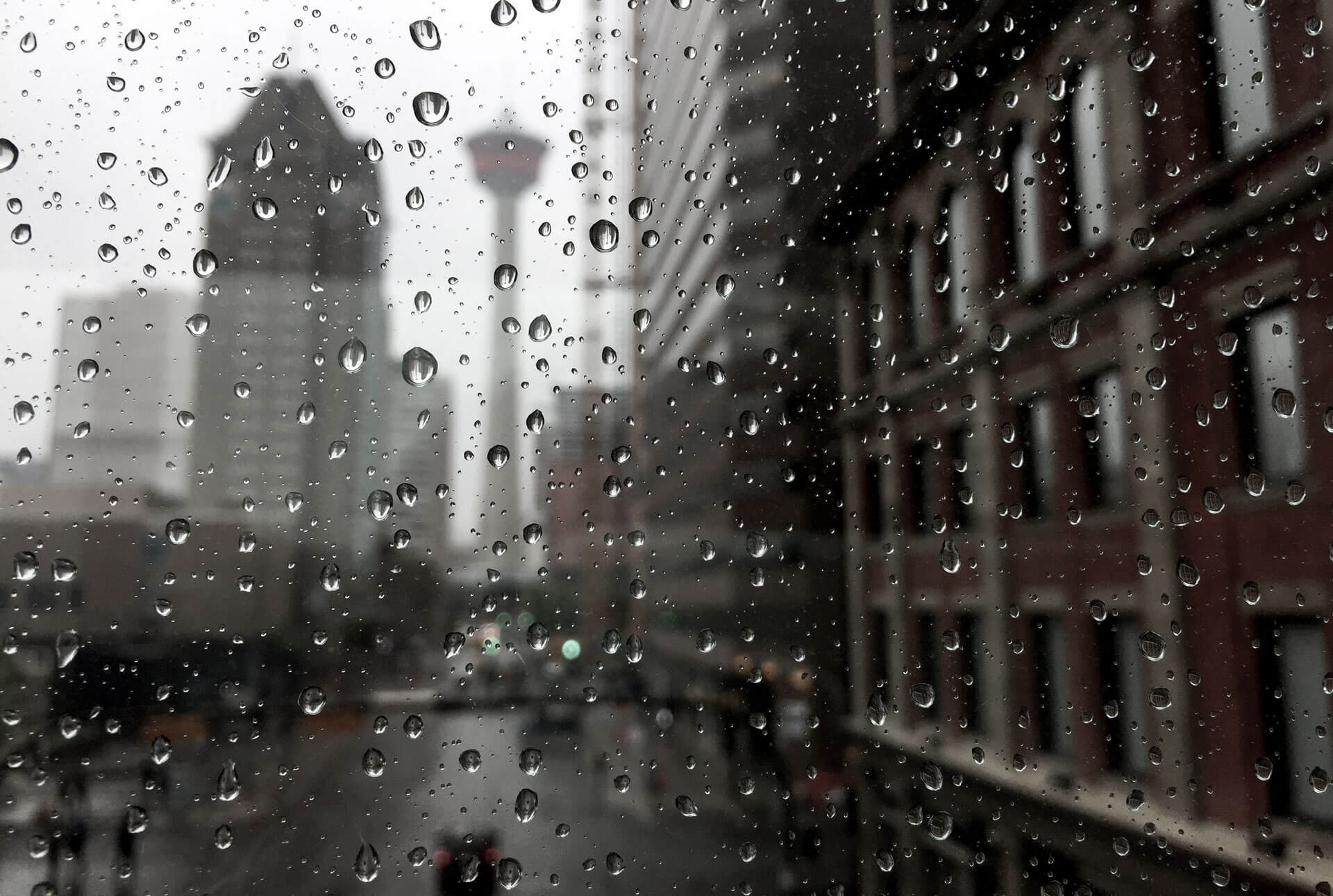 downtown calgary through a rainy window